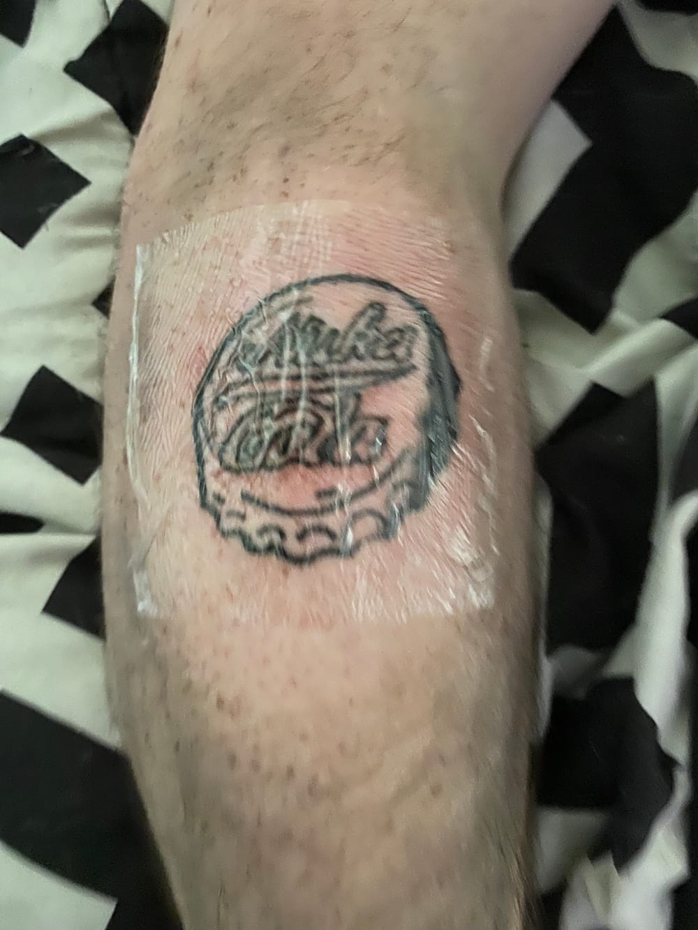 Tacoma Lewis — tattoo artist