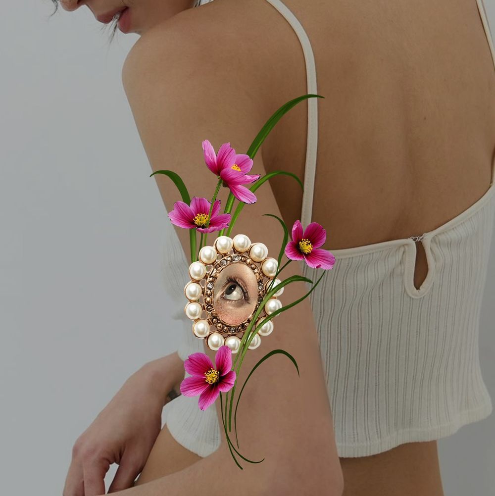 Flowers with eye brooch 